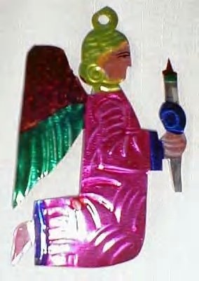 this tin angel is very like the one she had except for....